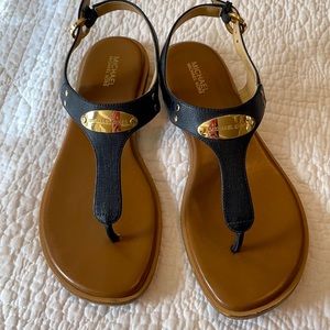 Michael Kors black leather thong sandals. Size 7 1/2.